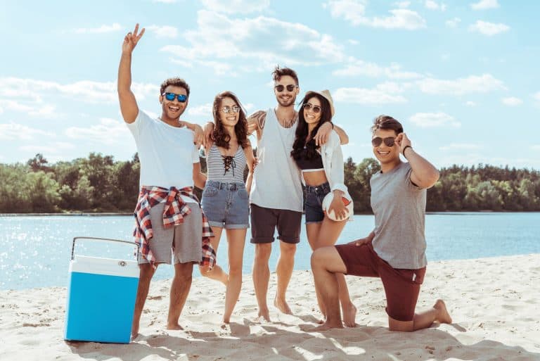 Group of friends enjoying a sunny day at the beach.