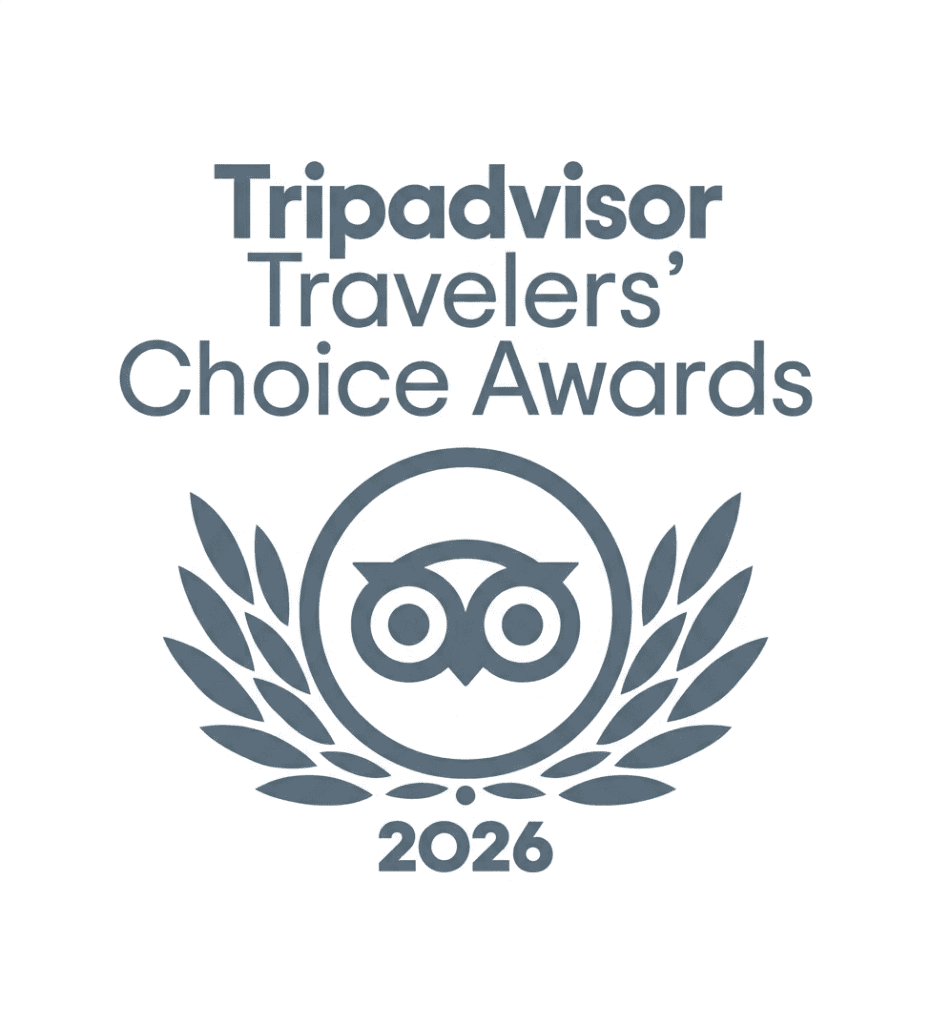 Tripadvisor Travelers’ Choice Awards 2026 logo featuring an owl and laurel wreath design in blue on a white background.