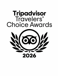 Black and white logo for Tripadvisor Travelers’ Choice Awards 2026, featuring an owl within laurel branches and bold text above.